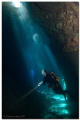   SpotlightThis photo made cave called Himmelsloch located westcoast Corfu Island. ceiling collapsed long time ago let sunbeams in. -Spotlight- Spotlight Island in  